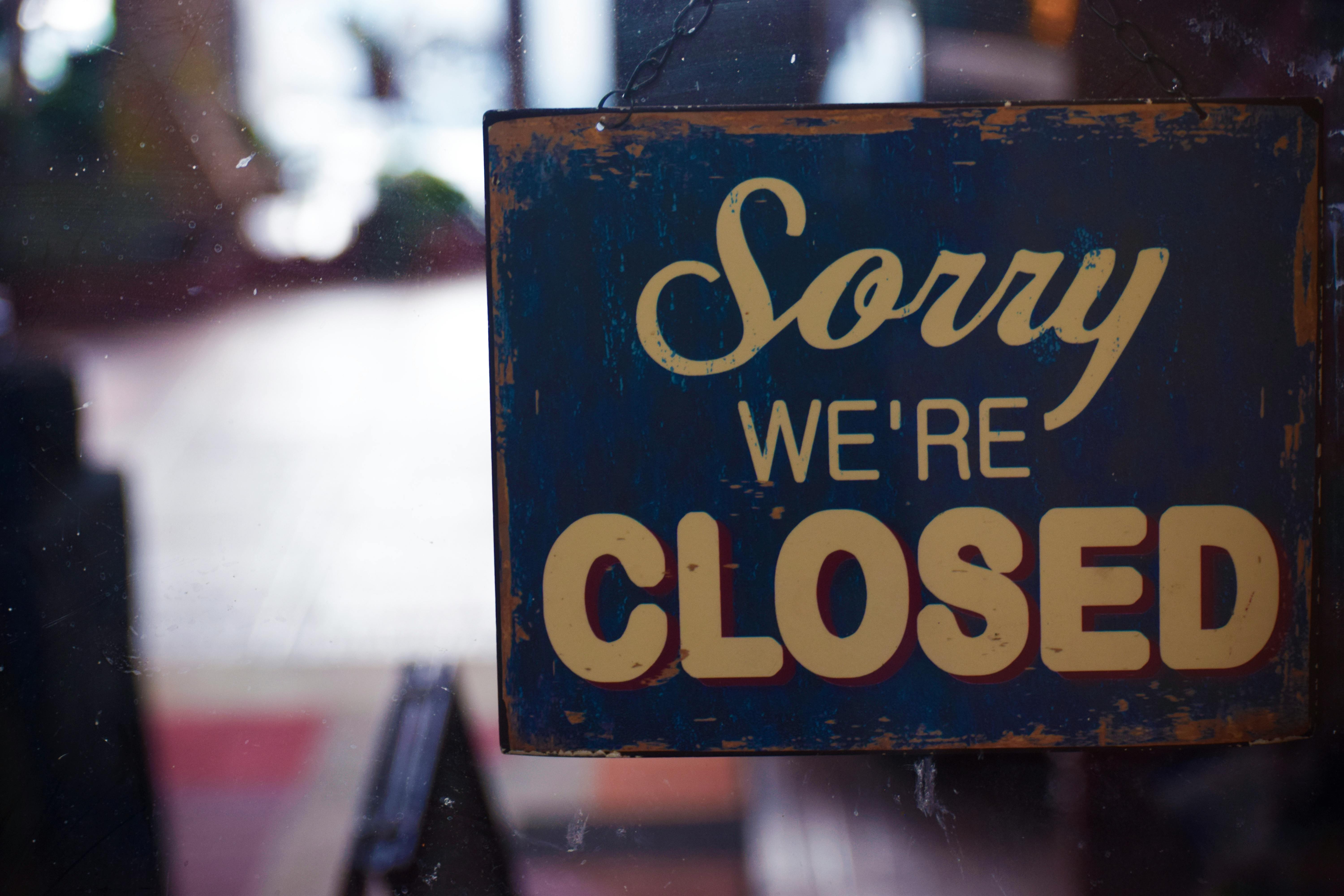 Closed government office representing real estate processing delays