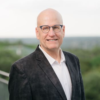 Portrait of Kent Redding, REALTOR®.